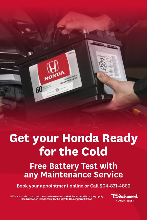 Technician installing a Honda vehicle battery in the engine bay, with promotional text offering a free battery test with any maintenance service at Birchwood Honda West and contact information displayed.