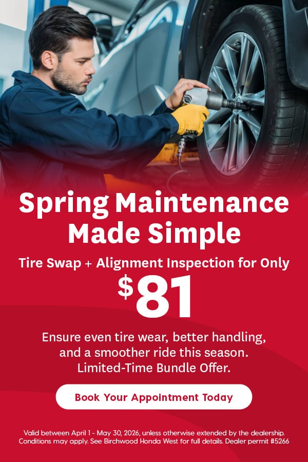 Technician using impact wrench to service car wheel, “Spring Maintenance Made Simple” promo offering tire swap and alignment inspection for $81, limited-time auto service deal with call-to-action “Book Your Appointment Today.”